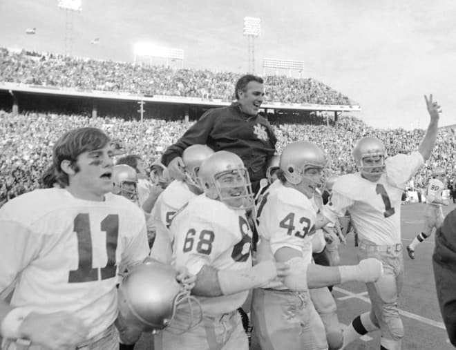 Ara Parseghian is given a victory ride after his Notre Dame team ends No. 1 Texas' 30-game winning streak in the 1971 Cotton Bowl with a 24-11 victory.
