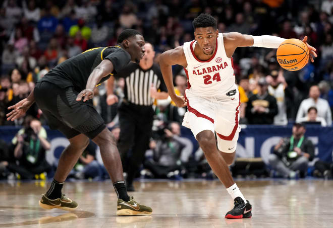 Alabama forward Brandon Miller (24) works past Missouri guard D'Moi Hodge (5) during the second half of a SEC Men s Basketball Tournament semifinal game at Bridgestone Arena in Nashville, Tenn. Photo | George Walker IV / The Tennessean / USA TODAY NETWORK