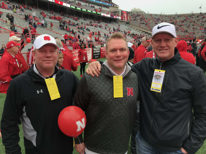 Vedral's father Mike (right), and his two brothers Jon (left) and Mark (center) all played at Nebraska. They stood together on the sideline for Noah Vedral's first spring game in 2018.