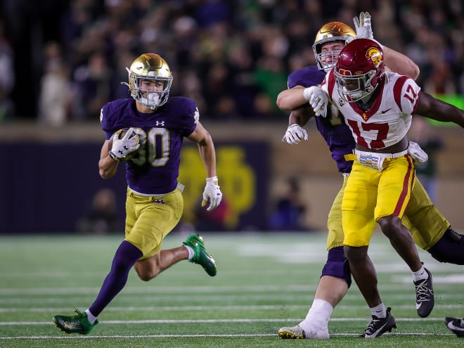 Wide receiver Jordan Faison, left, and Notre Dame football will end the 2024 regular season with a game at USC.