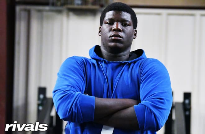 Texas defensive tackle Ike Iwunnah signed with Michigan Wolverines football recruiting, Jim Harbaugh.