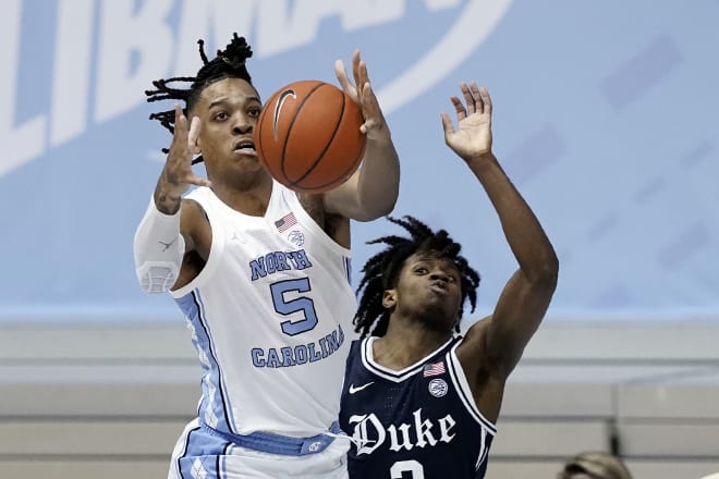 North Carolina forward Armando Bacot (5) secures a rebound against Duke. Bacot is UNC's leading rebounder at eight per game.