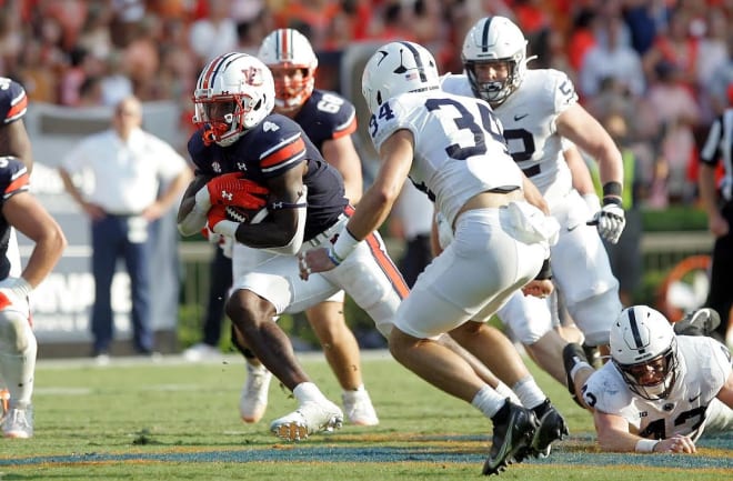 Tank Bigsby runs the ball against Penn State.