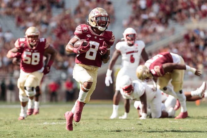 Florida State Football's Treshaun Ward breaks free for a big run earlier this season against Louisville.