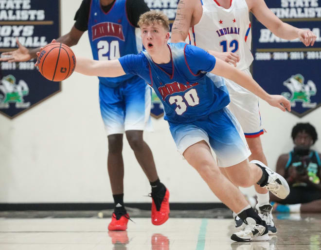 Junior All-Star Jack Benter (30) rushes up the court Wednesday, June 7, 2023, during the Indiana All-Stars vs. Juniors boys game at Cathedral High School in Indianapolis.
