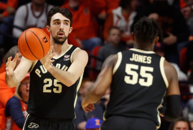 Purdue Boilermakers guard Ethan Morton (25) passes the ball to Purdue Boilermakers guard Lance Jones (55) during the NCAA men s basketball game against the Illinois Fighting Illini, Tuesday, March 5, 2024, at State Farm Center in Champaign, Ill.