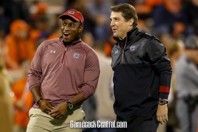 Will Muschamp (right) has led the Gamecocks into a bowl game in his 1st season as head coach.