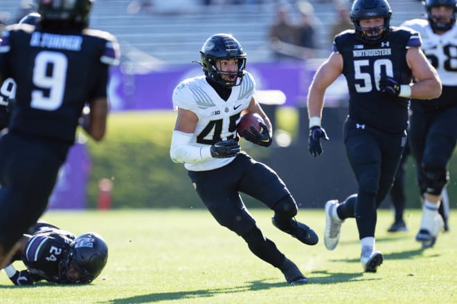 Nov 18, 2023; Evanston, Illinois, USA; Purdue Boilermakers running back Devin Mockobee (45) runs with the ball against the Northwestern Wildcats at Ryan Field. Mandatory Credit: Jamie Sabau-USA TODAY Sports