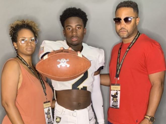 Official Visit: from L-to-R:: Dawn Robinson (mom), QB commit Larry Robinson and Larry Robinson Sr (Dad)