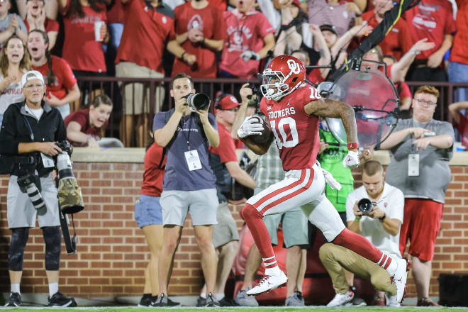 Oklahoma's Theo Wease (10) runs for a touchdown in the first quarter during a college football game between the University of Oklahoma Sooners (OU) and the Kansas State Wildcats at Gaylord Family - Oklahoma Memorial Stadium in Norman, Okla. Photo |  NATHAN J FISH/THE OKLAHOMAN / USA TODAY NETWORK