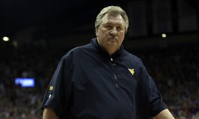 Bob Huggins believes that his West Virginia Mountaineers basketball team will benefit from the trip to Spain.