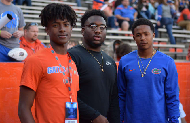 Newest Gators commit, 2019 four-star wideout John Dunmore (left), 2018 four-star defensive tackle Nesta Silvera (middle) and 2017 cornerback signee Marco Wilson (right)