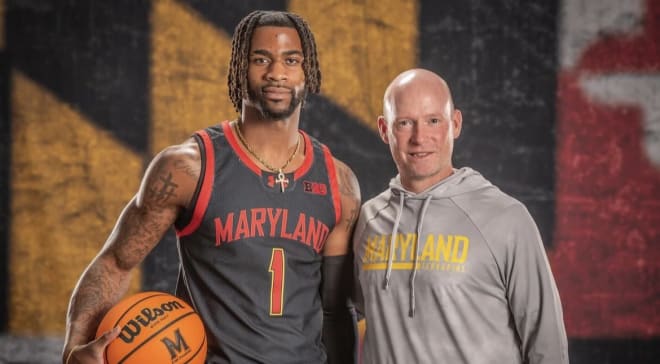 New Maryland guard Selton Miguel (No. 1) with head coach Kevin Willard while on his official visit. 
