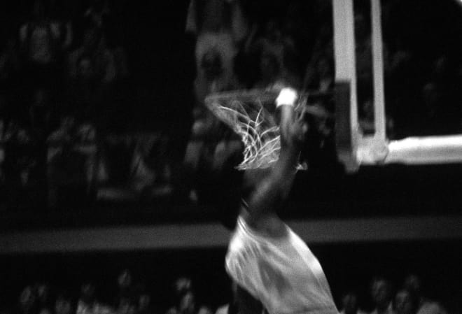 NCSU alum Pat Walker took this picture of high-flying Thompson's only college dunk.