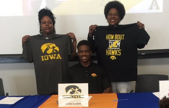 Florida wide receiver Calvin Lockett and family on signing day in December 2017.