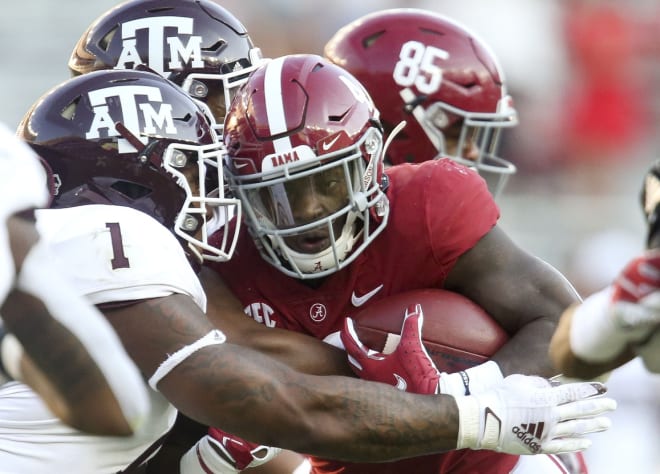 Texas A&M linebacker Buddy Johnson (1) hits Alabama running back Brian Robinson Jr. (4) as he runs in the middle at Bryant-Denny Stadium. Alabama defeated A&M 52-24.  Photo | Imagn
