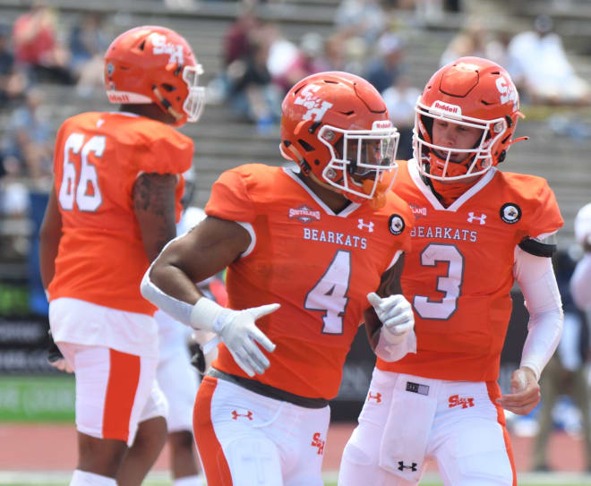 Sam Houston State running back Ramon Jefferson (4) celebrates with quarterback Eric Schmid during a gamer earlier this season in Huntsville, Texas.