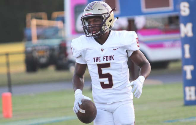 Kaletri Boyd found the end zone three different ways in King's Fork's 41-0 season-opening thumping of Smithfield