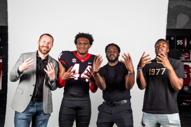 L-R: Georgia inside linebackers coach Glenn Schumann, 2024 linebacker Kristopher Jones, linebacker assistant coach Juwan Taylor, and freshman linebacker CJ Allen. Photo via Jones' Twitter.