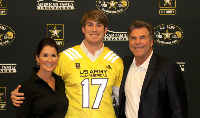 Sarah, Walker and Doug Little at the ceremony to present him the honorary U.S. Army All American Bowl jersey.