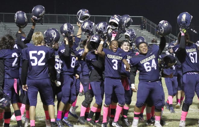 Kellis players celebrate a home win from last October.  The Cougars went 4-1 at home in Glendale last season.  (Photo Courtesy of Ben Kullos)