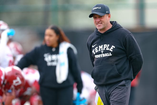 Offensive line coach looks on during Saturday's scrimmage. 