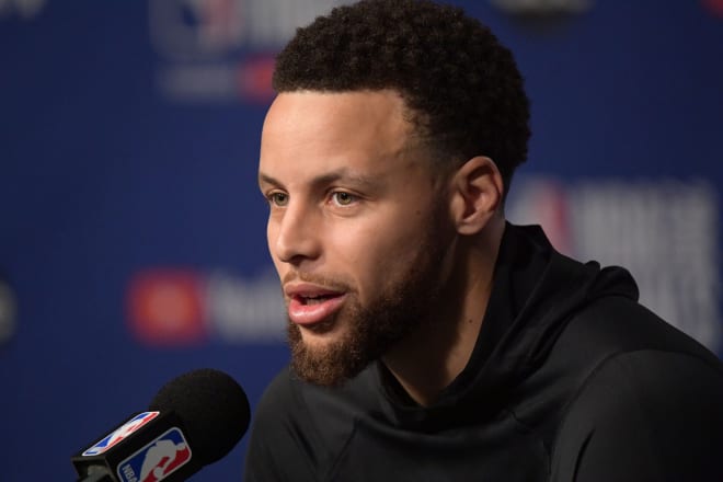 Stephen Curry taking questions on NBA Finals Media Day 