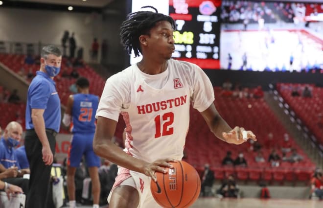Houston transfer Tramon Mark has withdrawn his name from the 2023 NBA Draft and will return for another season of college basketball with Arkansas. 
