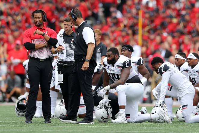 Notre Dame Fighting Irish football defensive coordinator Marcus Freeman with head coach Luke Fickell during his time with the Cincinnati Bearcats