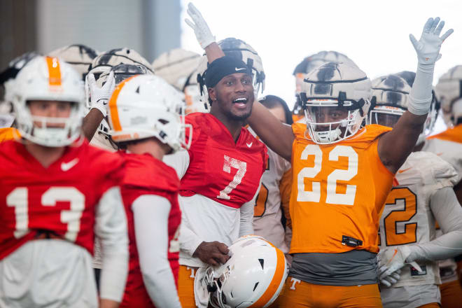Tennessee quarterback Joe Milton III (7) leads the teams in a huddle during spring football practice on Monday, March 20, 2023.
