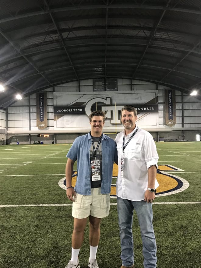 Jump poses with his dad after landing his Georgia Tech offer over the weekend.