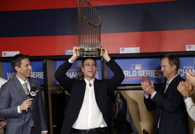 Chicago Cubs president Theo Epstein celebrates with the Commissioner's Trophy after the Cubs' World Series Game 7 win over the Cleveland Indians earlier this month. 