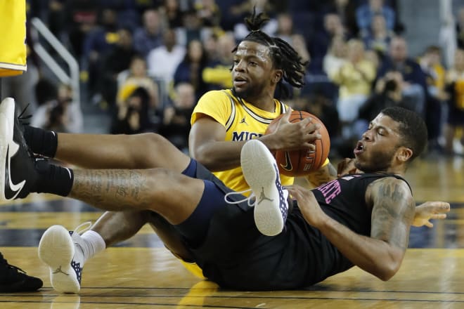 Senior point guard Zavier Simpson and Michigan were in scramble mode all night against Penn State.
