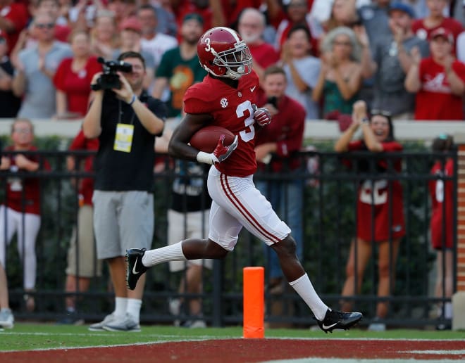 Alabama receiver Calvin Ridley runs in a touchdown against Colorado State. Photo | Getty Images