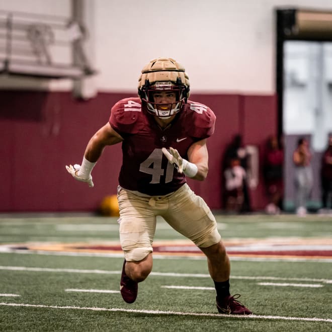 Lang runs through a drill during practice inside the FSU Indoor Practice Facility.