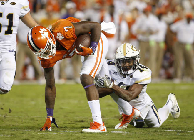 Corey Griffin aims to hold on to Mike Williams last year in Bobby Dodd Stadium