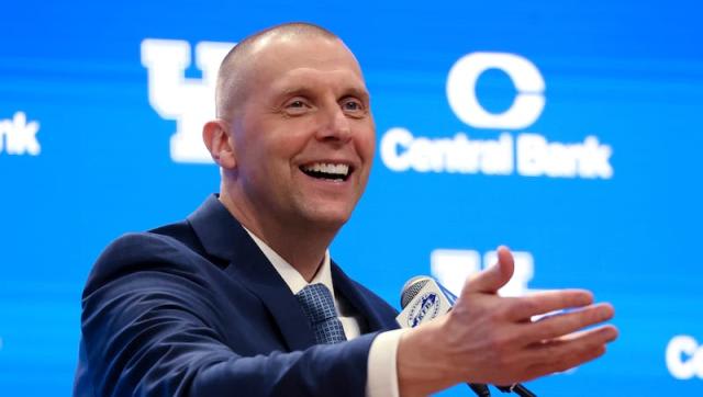 Mark Pope would love to get some smiles courtesy of this fall's offcial visitors (Photo by James Crisp/AP) 