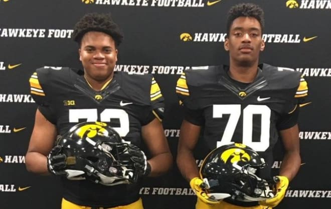 Dallas Fincher (#72 on the left) with teammate Bryce Mostella (#70) at Iowa on Sunday.