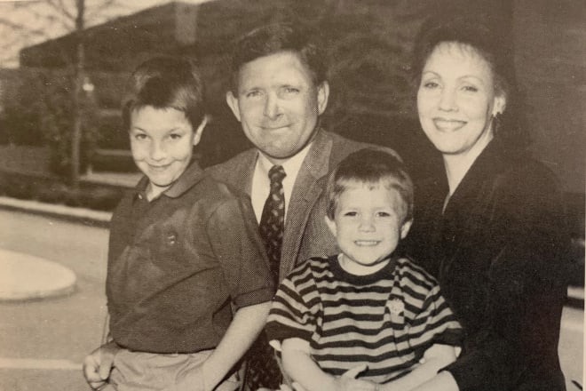 Bob Pittard and his family in front of the Butts-Mehre Building in the early 1990s.