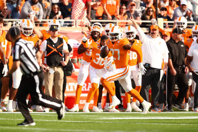 Tennessee defensive lineman James Pearce Jr. returns an interception for a touchdown in the fourth quarter of the Vols' 35-0 win over Iowa in the Cheez-It Citrus Bowl at Camping World Stadium on Jan. 1, 2024.
