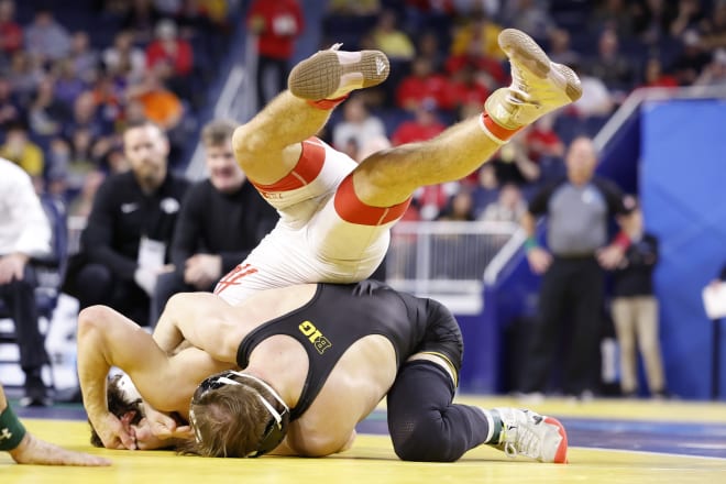 Spencer Lee puts Nebraska's Liam Cronin in danger in his win at 125 lbs. 