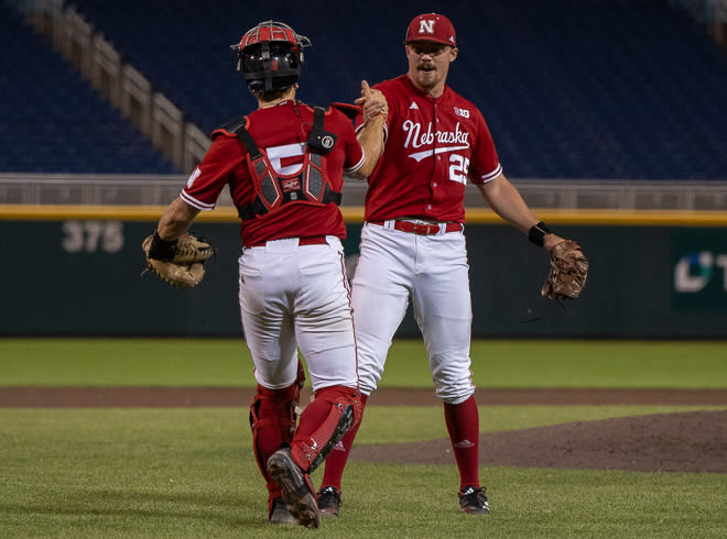 Nebraska baseball standouts Drew Christo (25) and Josh Caron (5) will help lead the Huskers into the NCAA Tournament