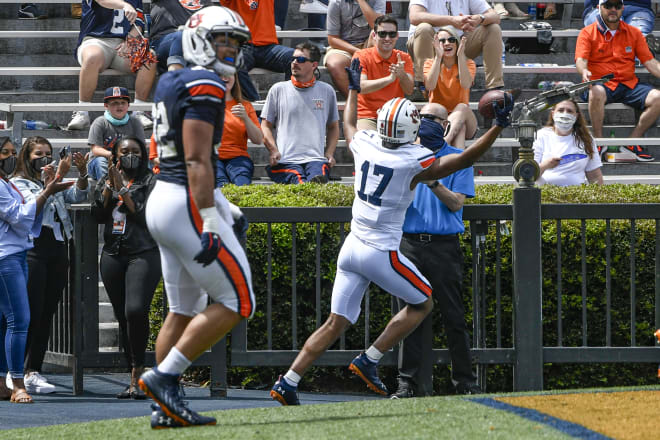 Elijah Canion celebrates a touchdown during A-Day.