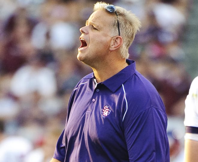 Then Stephen F. Austin head coach and Clemson grad J.C. Harper is shown here in 2010 during a game with Texas A&M in College Station (TX).