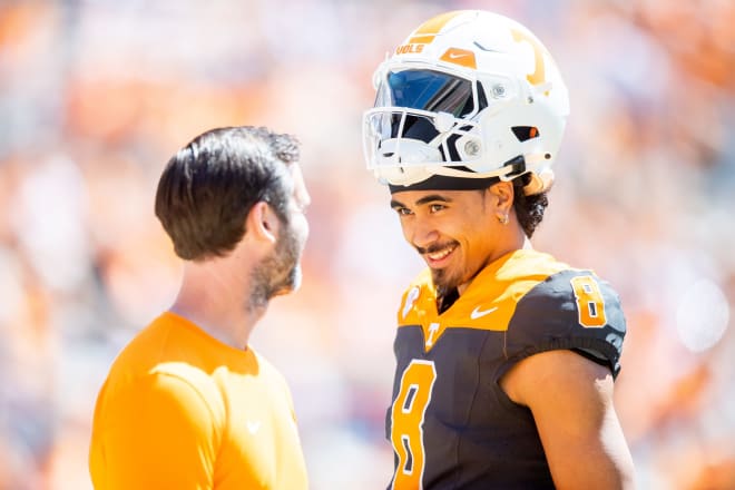 Tennessee quarterback Nico Iamaleava (8) and offensive coordinator Joey Halzle, left, during Tennessee's Orange & White spring football game at Neyland Stadium on Saturday, April 13, 2024.