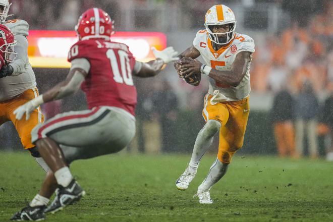 Tennessee quarterback Hendon Hooker takes off against Georgia on Nov. 5, 2022 at Sanford Stadium. 