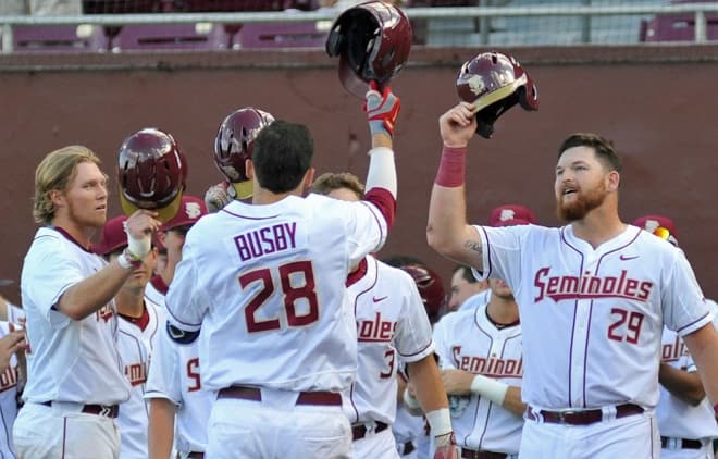 Florida State's Dylan Busby and Quincy Nieporte celebrate in the team's 16-3 win over Samford on Friday.