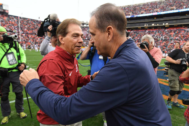 Alabama Crimson Tide head coach Nick Saban greets Auburn Tigers defensive coordinator Kevin Steele before the game at Jordan-Hare Stadium. Photo | John David Mercer-USA TODAY Sports