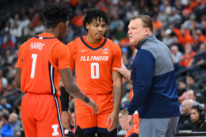 Illinois Fighting Illini head coach Brad Underwood talks with Illinois Fighting Illini guard Terrence Shannon Jr. (0) and Illinois Fighting Illini guard Sencire Harris (1) during the Continental Tire Main Event tournament college basketball game between the UCLA Bruins and the Illinois Fighting Illini on November 18, 2022, at the T-Mobile Arena in Las Vegas, NV. 