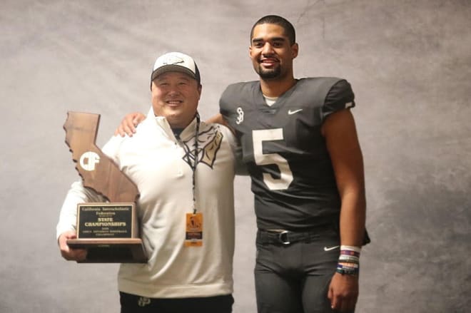 Lo and Uiagalelei with some hardware.